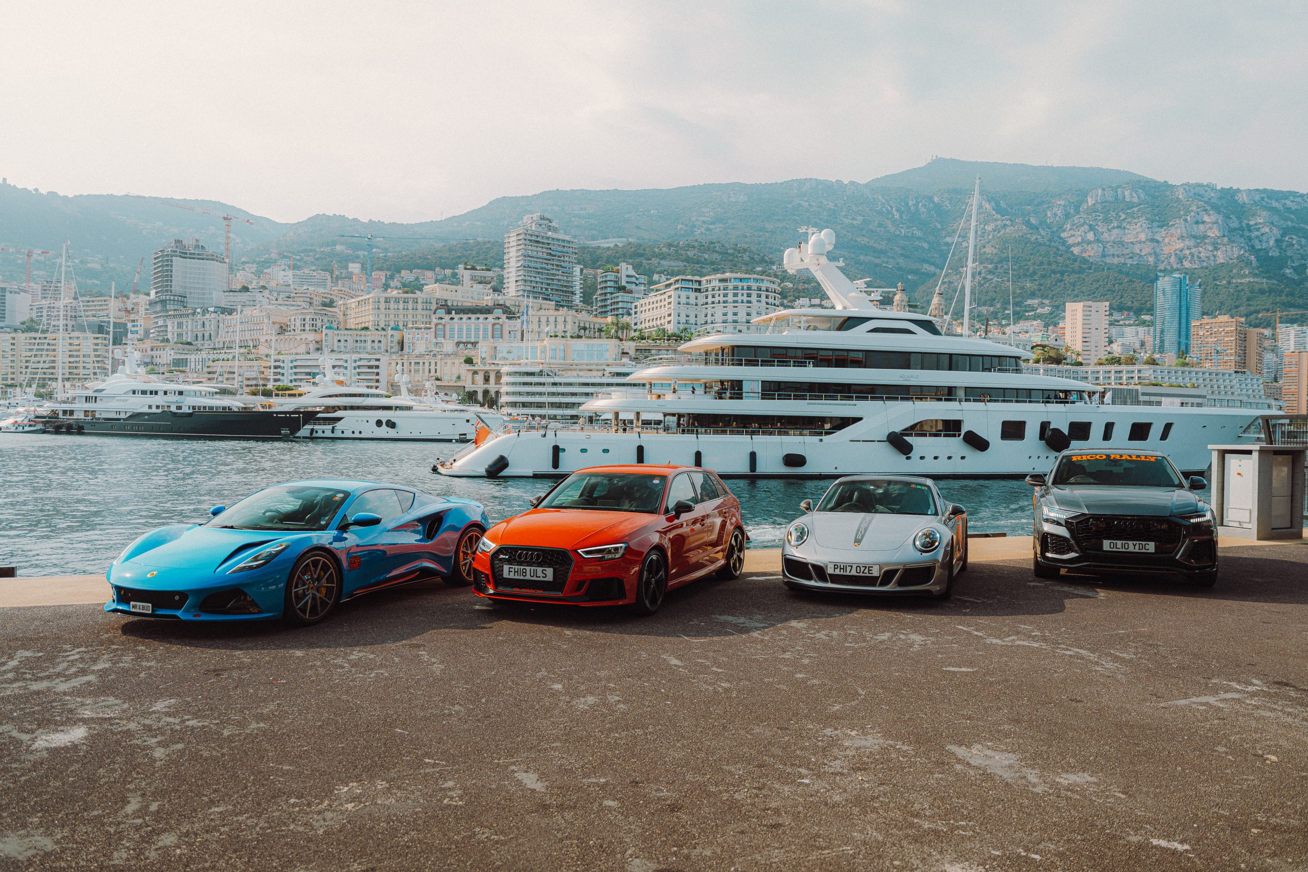 Rico Rally Lotus, Audi, Porsche on the harbour in Monaco