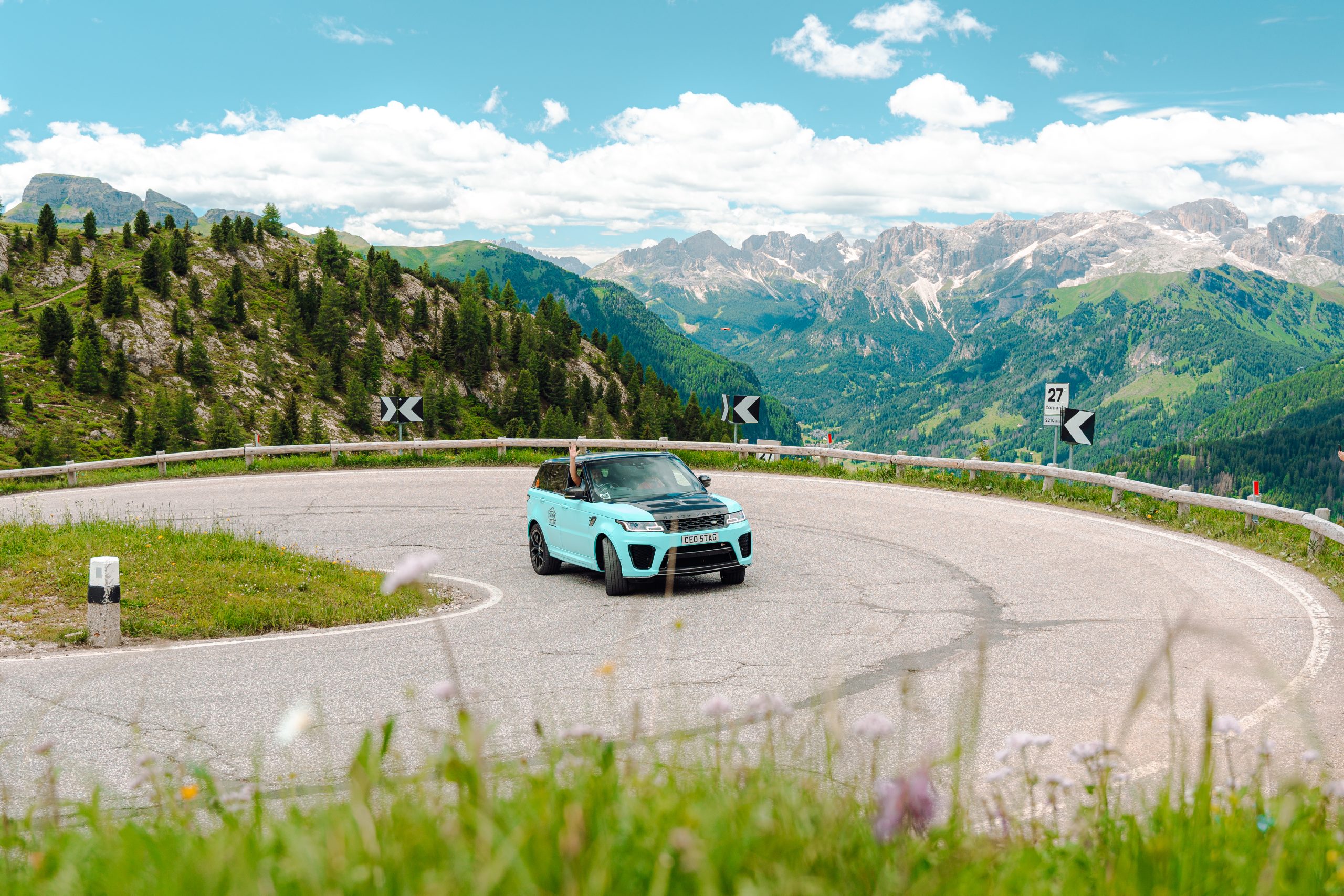 Range Rover taking a corner in the Dolomites