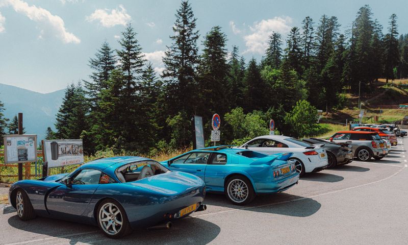 group of Rico Rally cars at the summit of Col de Turini
